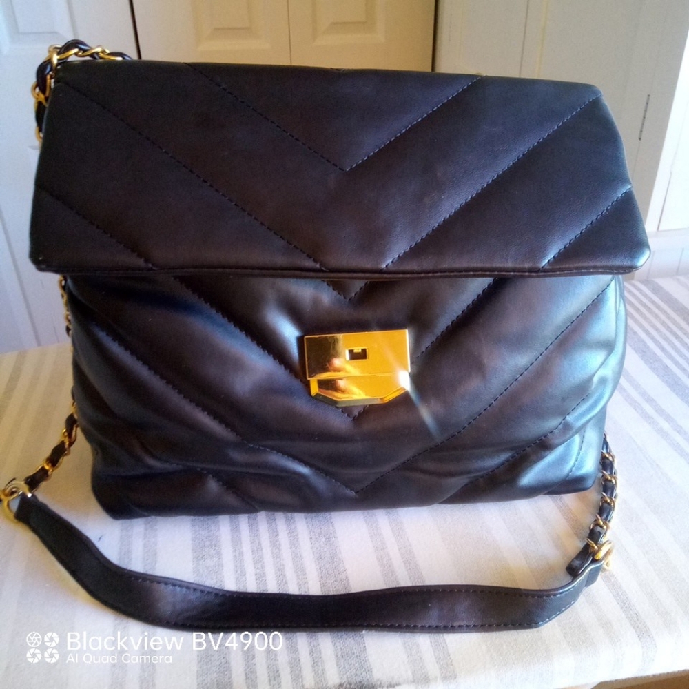 Lulu's chic black quilted crossbody bag. - Picture 1 of 10